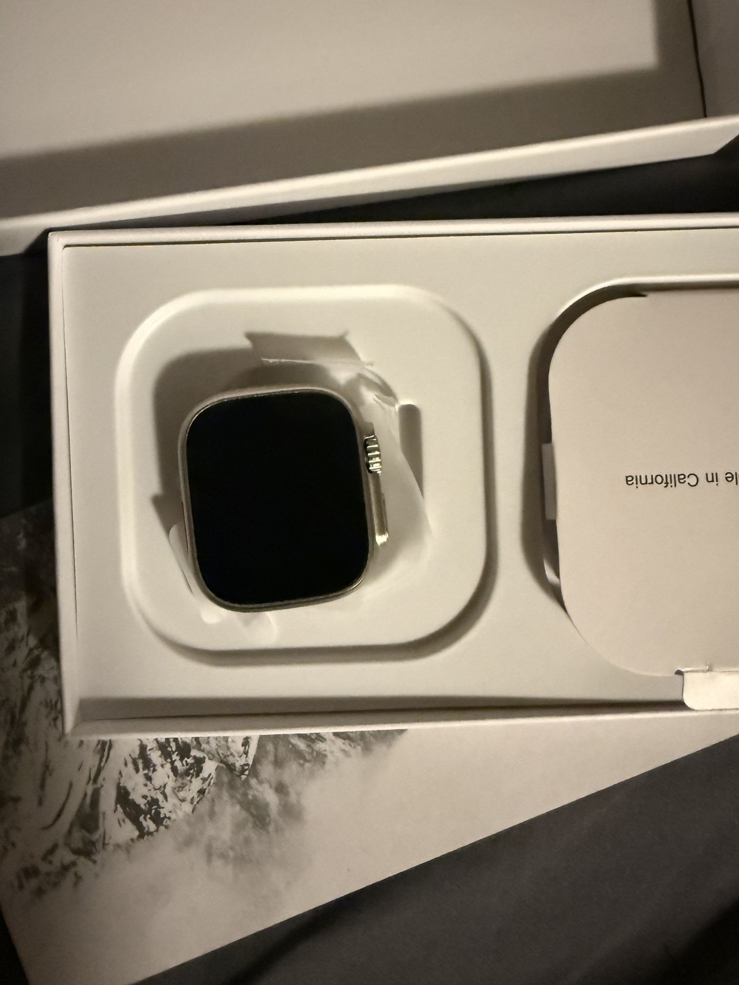 Apple Watch Ultra 2 49mm Titanium With Orange Band.