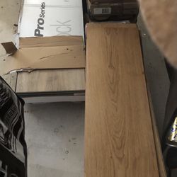 Free High Quality Flooring, Some Gray, Some Wood, Some Real Wood