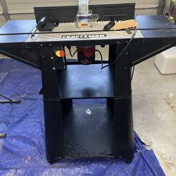 CRAFTSMAN  1 1/2  HORSEPOWER ROUTER WITH A CRAFTSMAN PRO ROUTER TABLE, AND EXTENDED HIEGHT BASE 