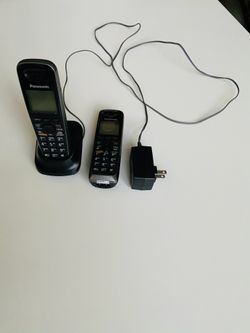 2 Panasonic KX-TGA653 Wireless Telephone Handsets; Panasonic PNLC1010 YA Cordless Phone Expansion Handset Charger Cradle; and Panasonic PQLV219 AC Ad