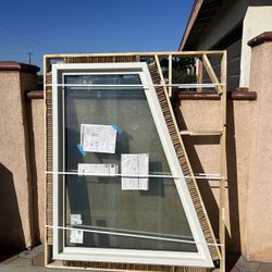 Andersen Trapezoid Window It’s Fixed 47/1/2wide X37/1/2  !!new !!