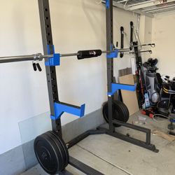 Squat Rack With Olympic Bar And Rubber Plates