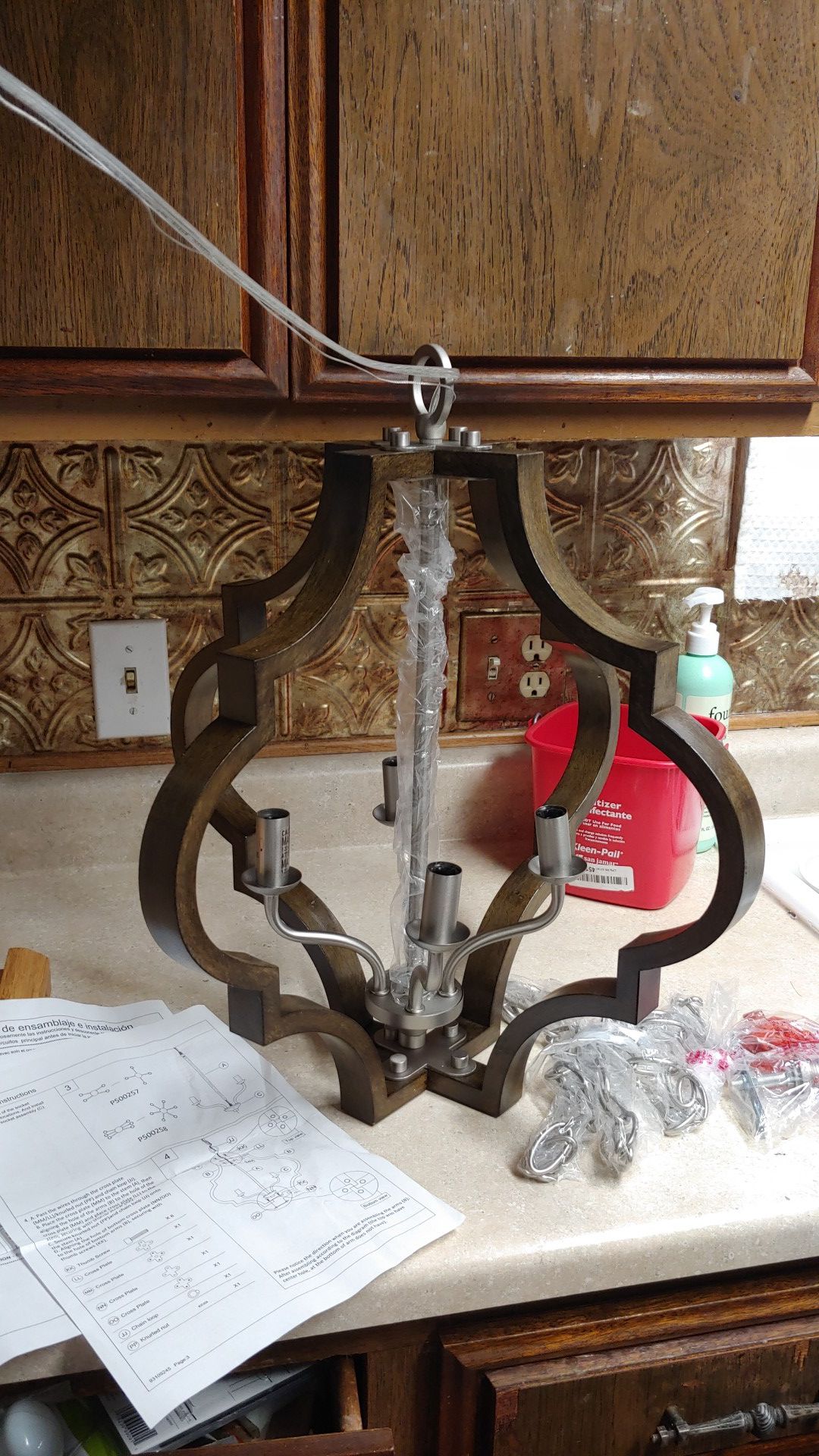 Chandelier it comes with Hardware ready to install it comes with the chain so you can cover the wire