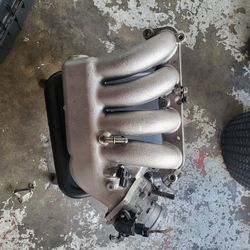 Honda K24 THROTTLE BODY W/TPS AND UPPER MANIFOLD.