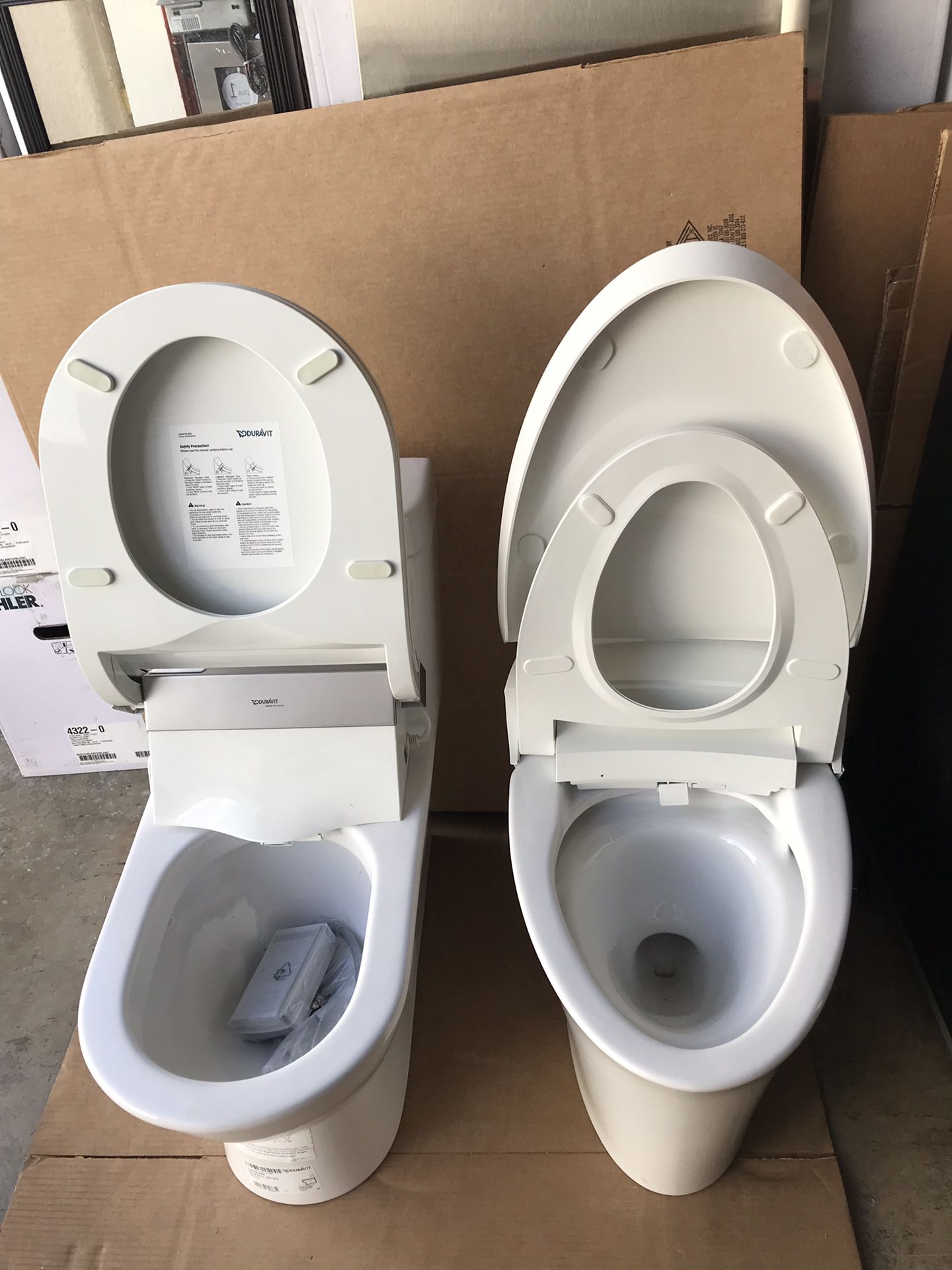 Theses twos toilets are showroom display brand are Kohler & duravit both toilets are electric seat bidet,