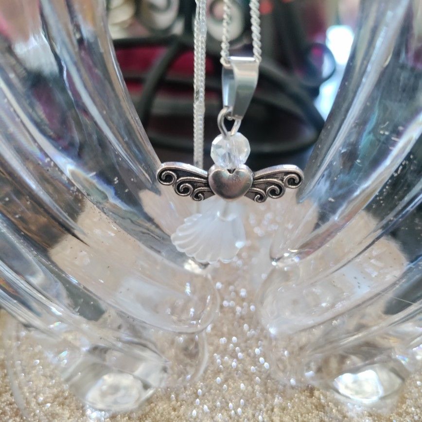 White Angel With Silver Chain