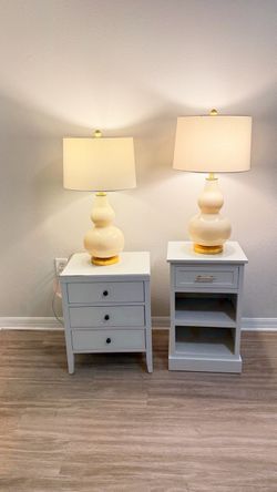 2 nightstands and 2 lamps