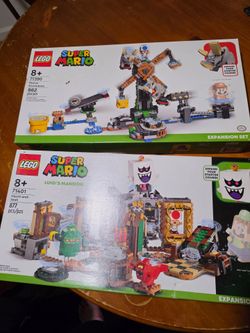 Two sets of LEGO Mario.