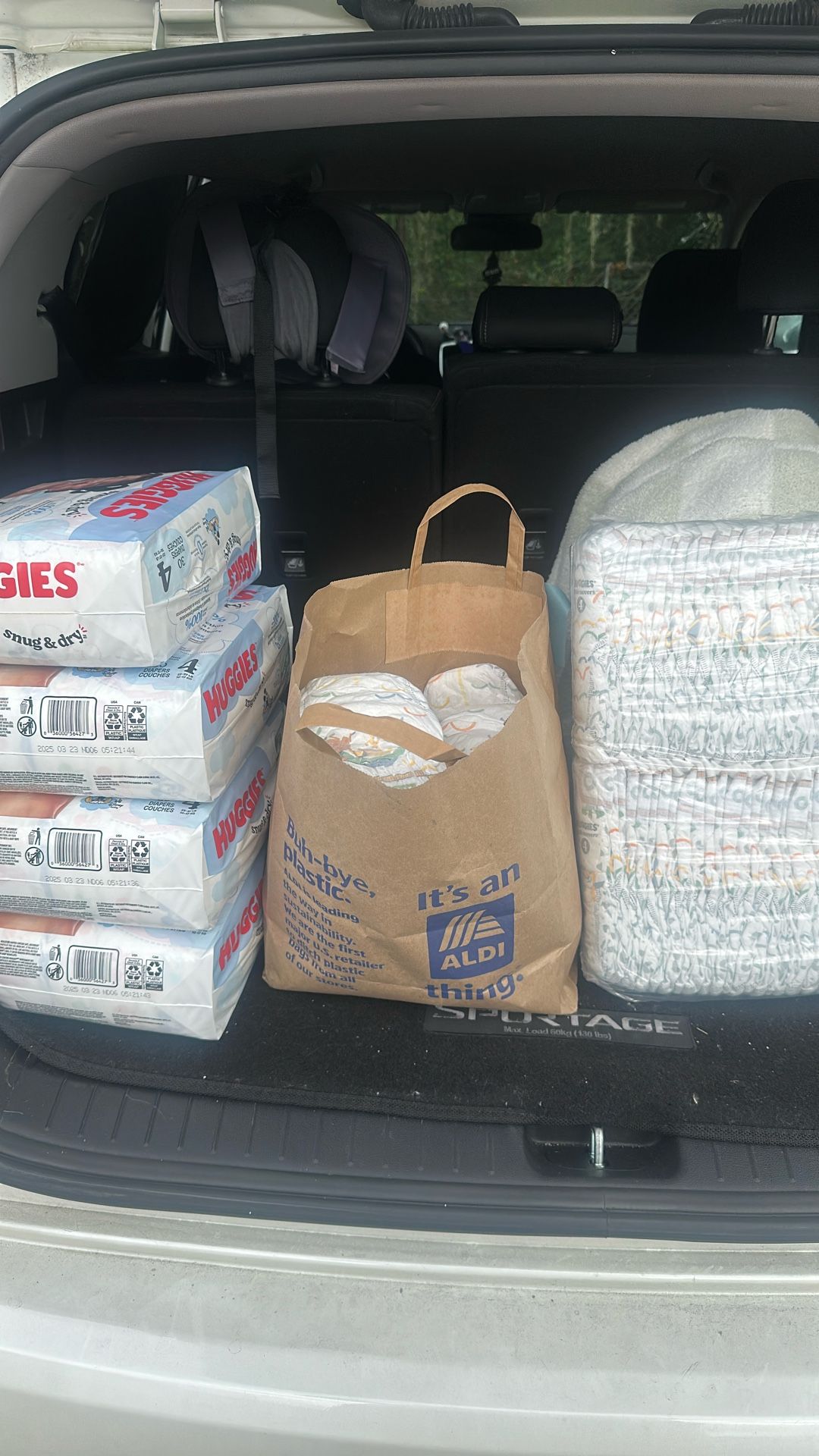 210 - Size 4 HUGGIES DIAPERS $40