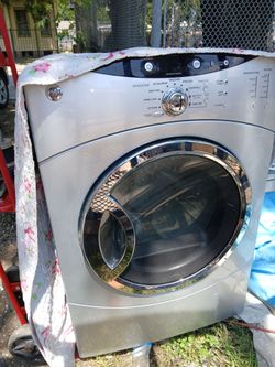 Fridge and gas dryer both in working condition  for $150 or best offer....