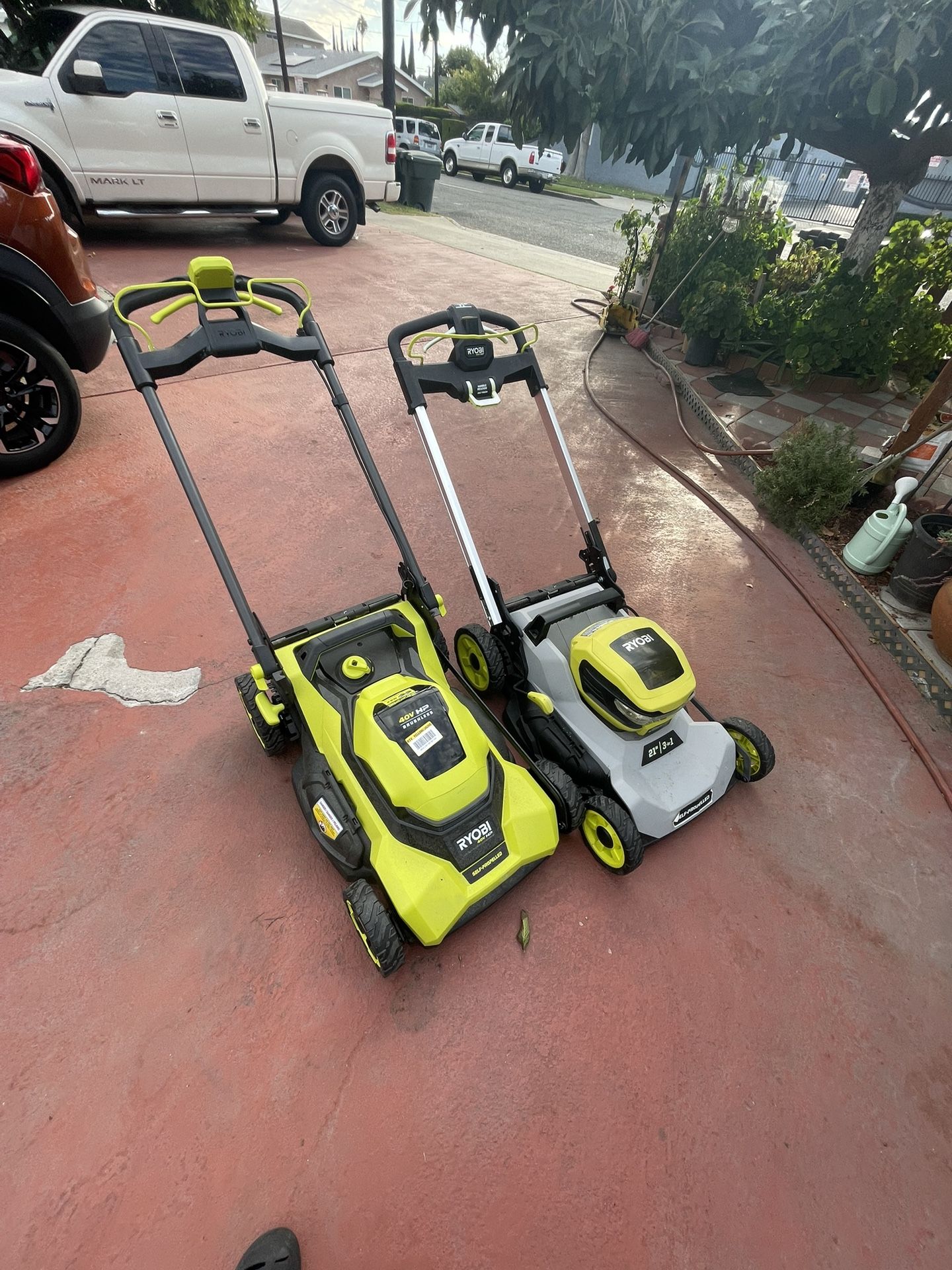 2 Broken Ryobi Lawn Mowers For Parts
