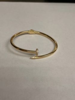 14K YELLOW GOLD BANGLE WITH CLEAR STONES