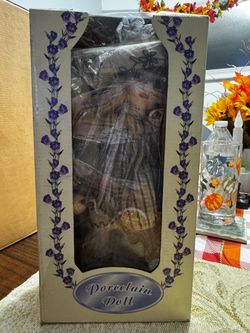 Hand Painted Porcelain Doll with Teddy Bear