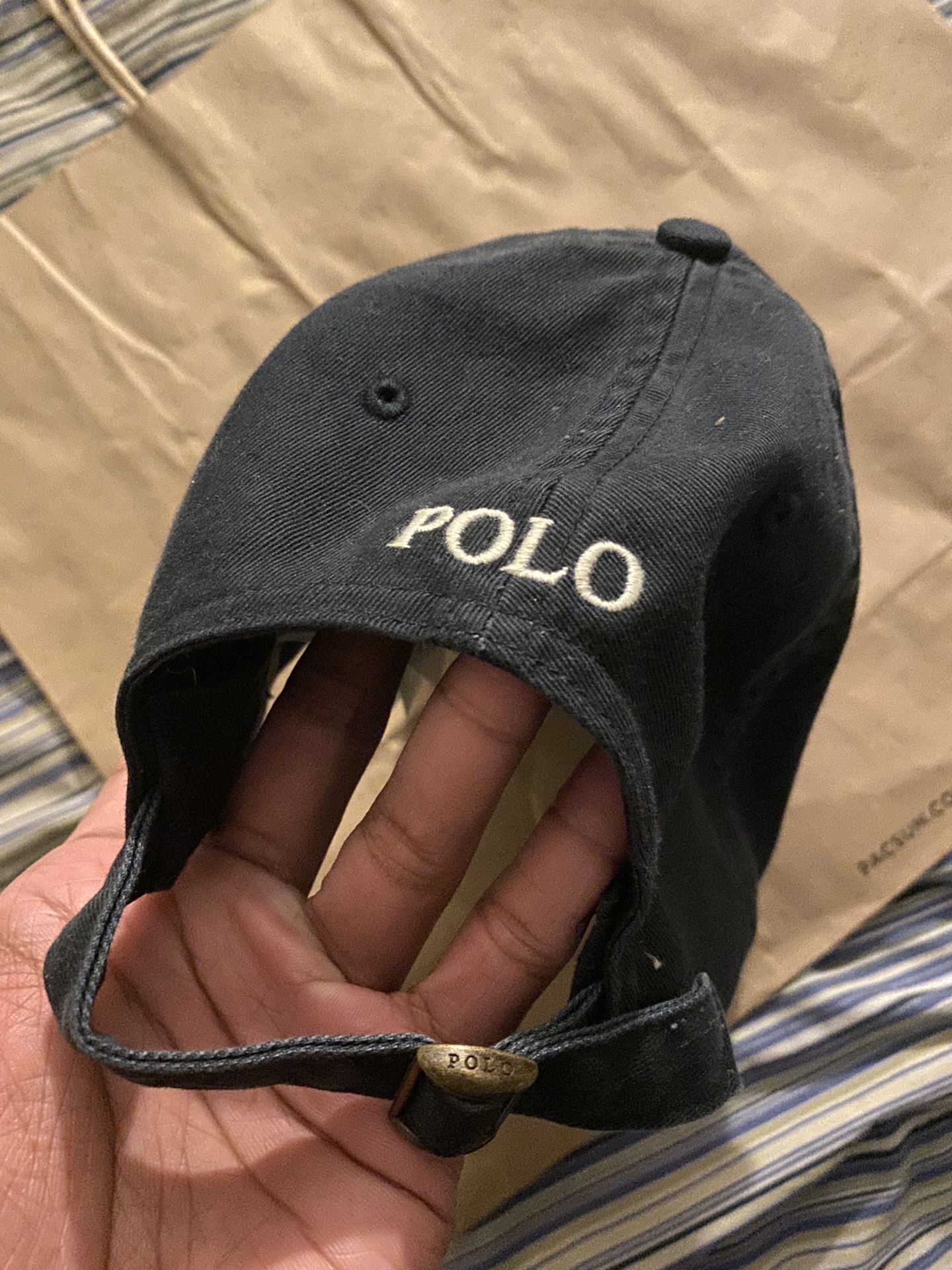 Black polo hat