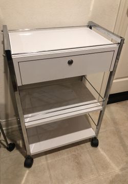 Cosmetic desk with drawers and rollers