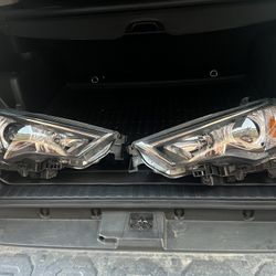 Like Brand New Toyota 4Runner OEM Head Lights With  LED  Bulbs$600 OBO 