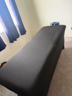 Massage table
