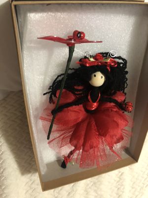 Photo Lady bug flower doll red and black