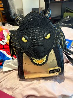 Loungefly Black Gold Dragon Mini ackpack, which is an exclusive release