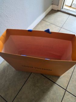 Louis Vuitton and Gucci merchandise bags