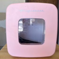 Pink mini fridge