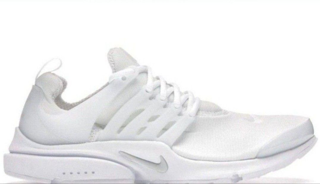 The White Nike Air Presto in Women's Size 6 is a sleek and stylish athletic shoe designed for comfort and performance.