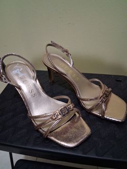Guess gold lady's shoes