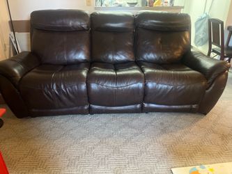 Electric reclining sofa; normal wear and tear. Purchased from living spaces