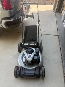 21 in. 140 cc Briggs and Stratton Walk Behind Gas Push Lawn Mower with Height Adjustment and with Mulch Bag
