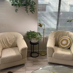 Pair Of Vintage Leather Swivel Chairs