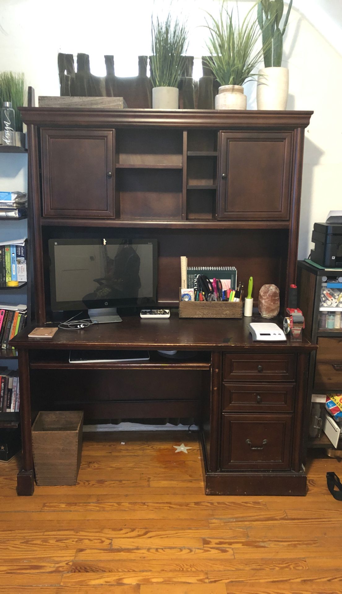 Dark wood desk with hutch