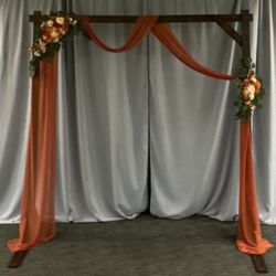 Burnt Orange Drapery With Flowers