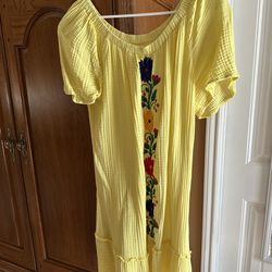 Bright yellow embroidered dress
