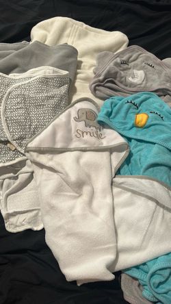 baby swaddle and towels