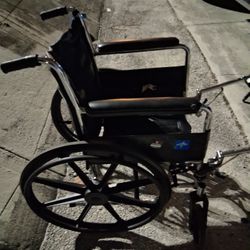 Wheelchair With Leg Holders