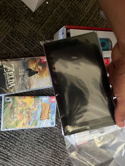 Nintendo Switch + Animal Crossing + Zelda: Breath of the Wild