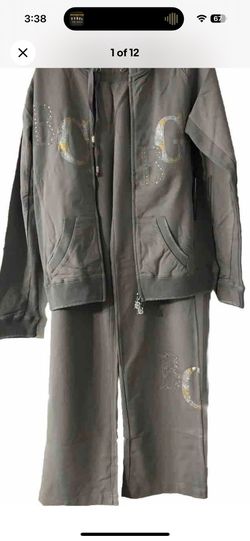 BCBG Maxazria Medium Mist grey Women’s tracksuit BC13683P new.  Measurements jacket width 36”, sleeve 28” length 22” Pants waist 28”, length 44” 