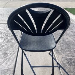 Folding black chairs 