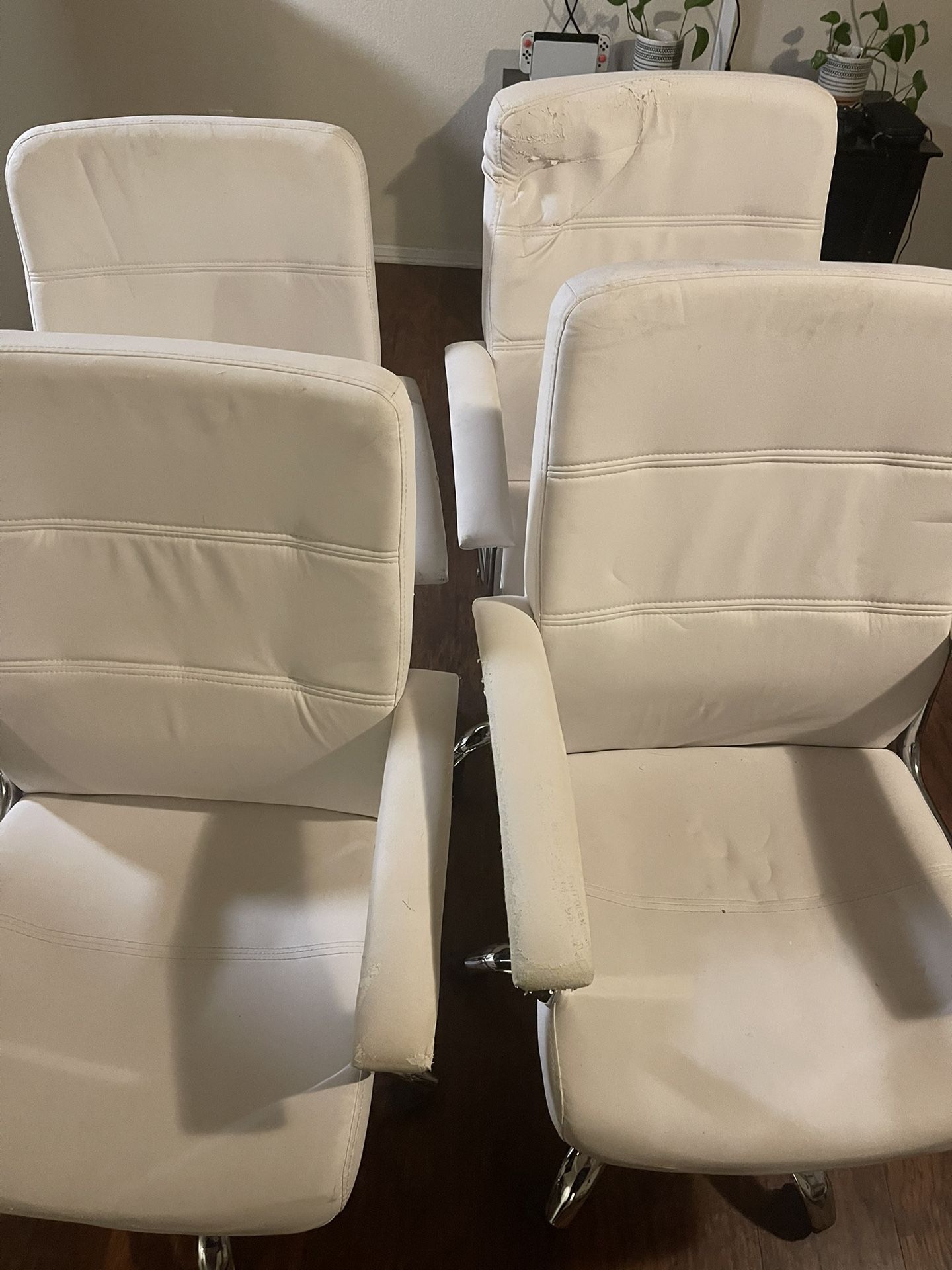Four White Office Chairs (wheels and Hydraulics Working)