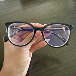 Rag & Bone eyeglasses with a black frame RNB3029 YRQ 140