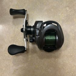 Left hand retrieve baitcaster