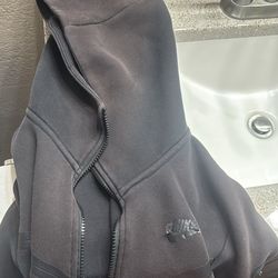 Faded black Nike tech Xs