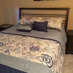 one queen sized bed and frame and one twin sized bed and frame