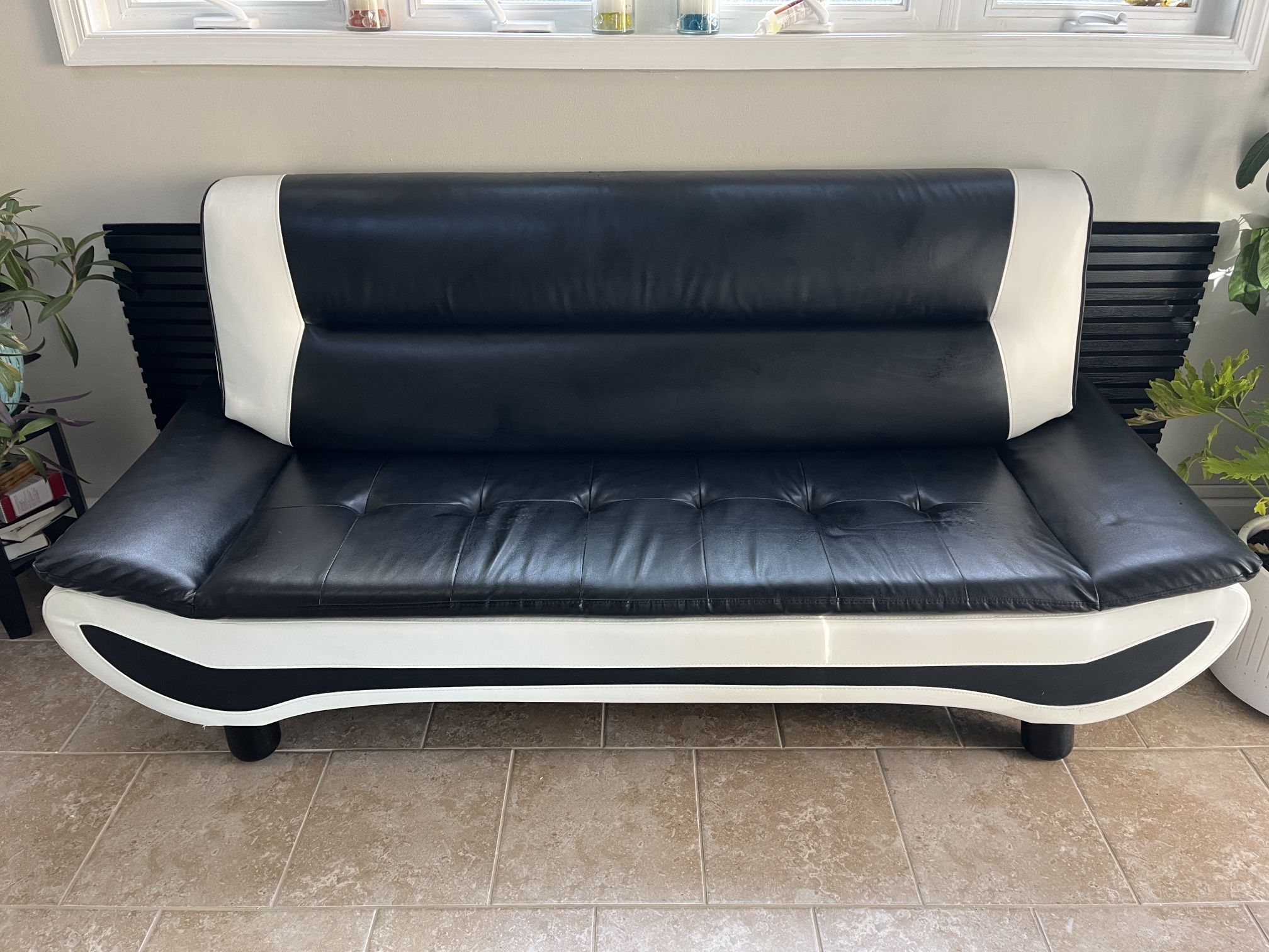 BLACK AND WHITE VINYL COUCH