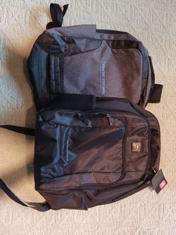Two large black backpacks