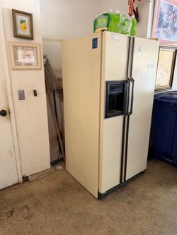 Full size white Kenmore refrigerator
