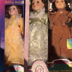 New In Boxes 3 Porcelain Dolls 