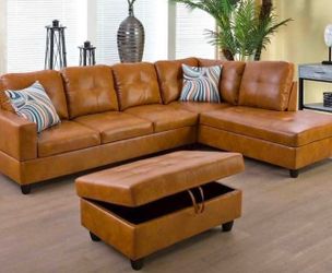 Carmel leather sectional couch and ottoman