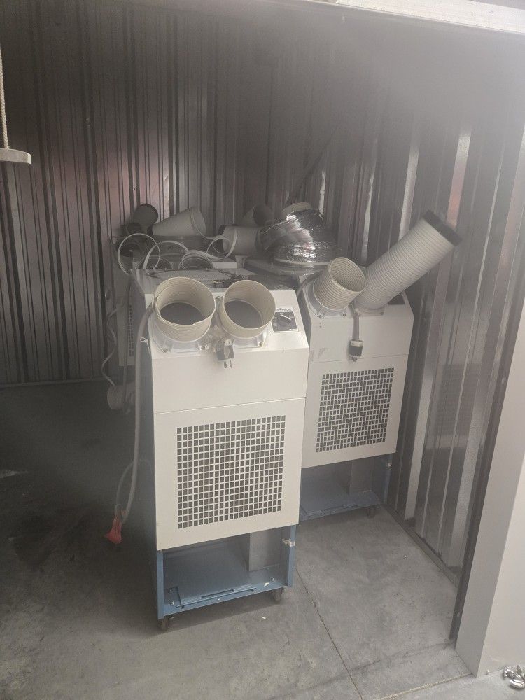 24000 BTU. COOLIN. MOVIN PORTABLE AIR CONDITIONER