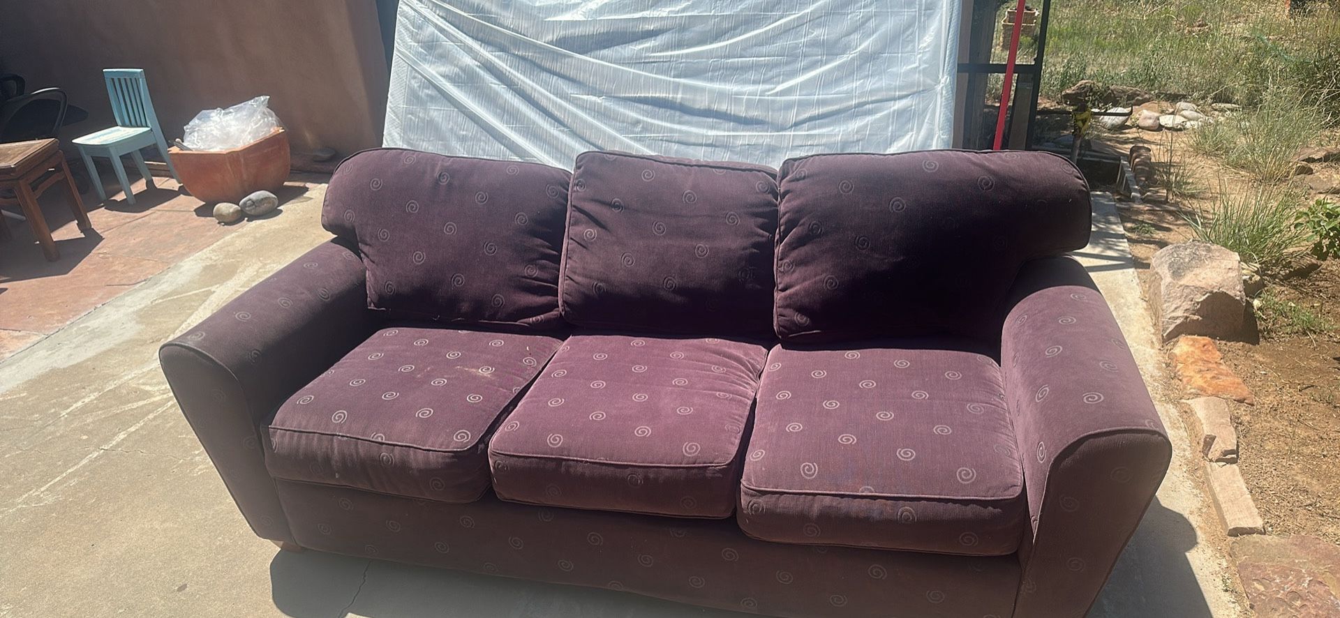 Clean super comfy dark purple couch for sale in Santa Fe. No damage light ware. All cushions included. Pickup required